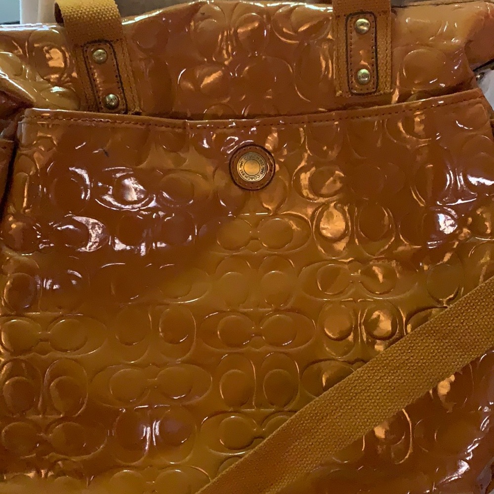 Coach patented leather handbag